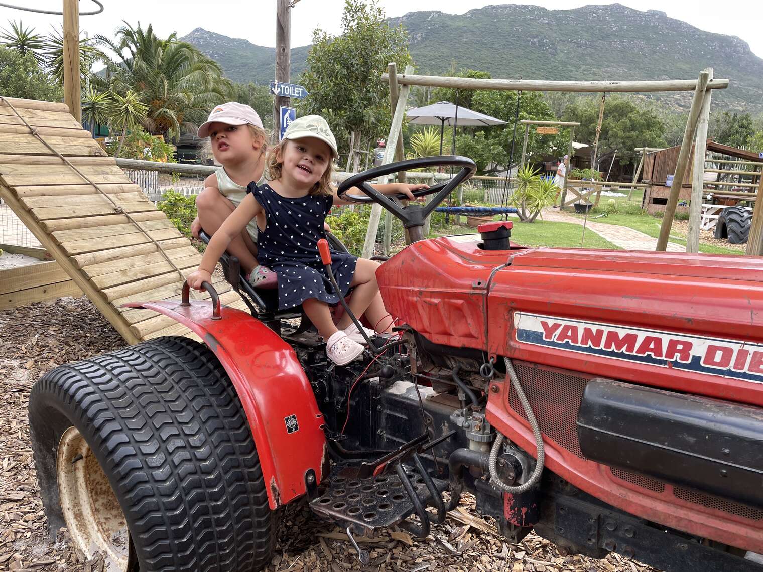 Kids playing on tractor